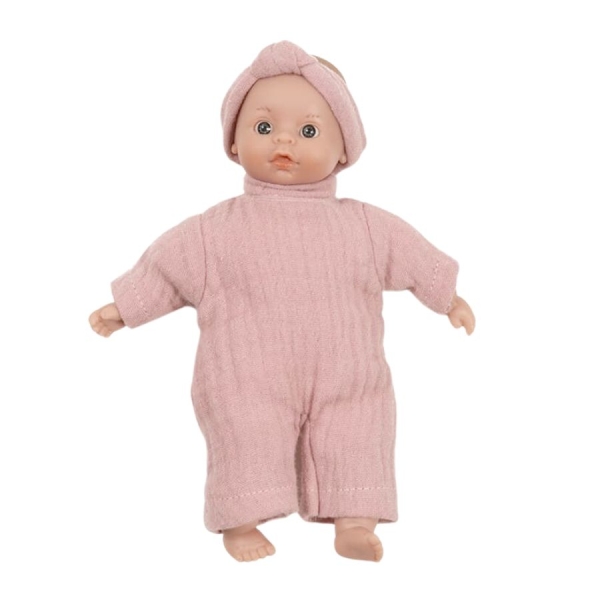 Minikane Minis Téa doll in a pink jumpsuit and headband